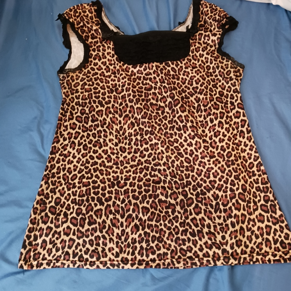 A vintage leopard print shirt. It's a size 2xl